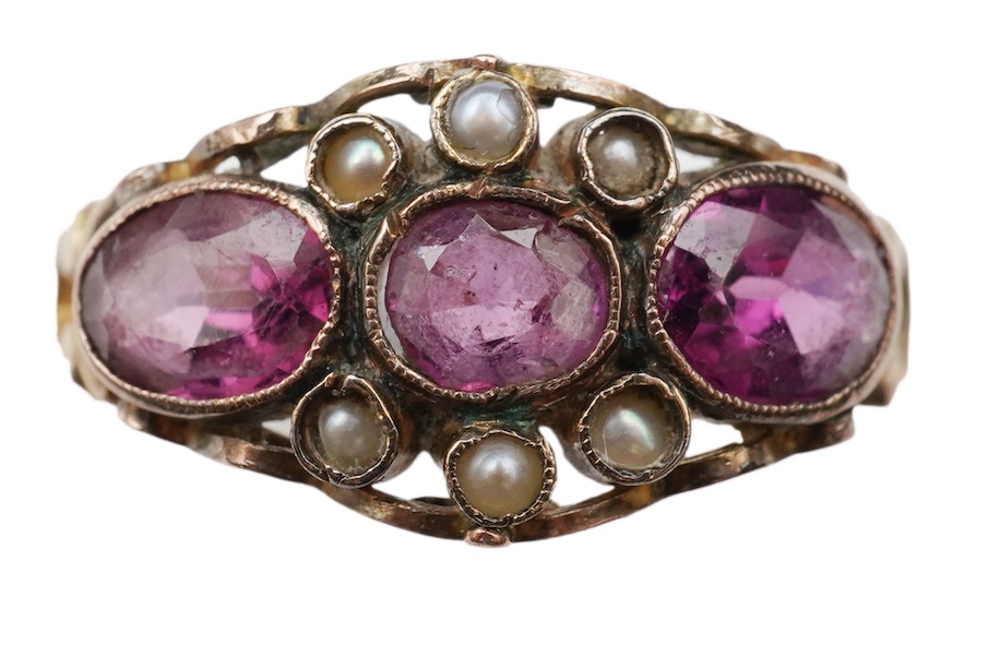 A Victorian garnet and seed pearl ring, mid 19th century